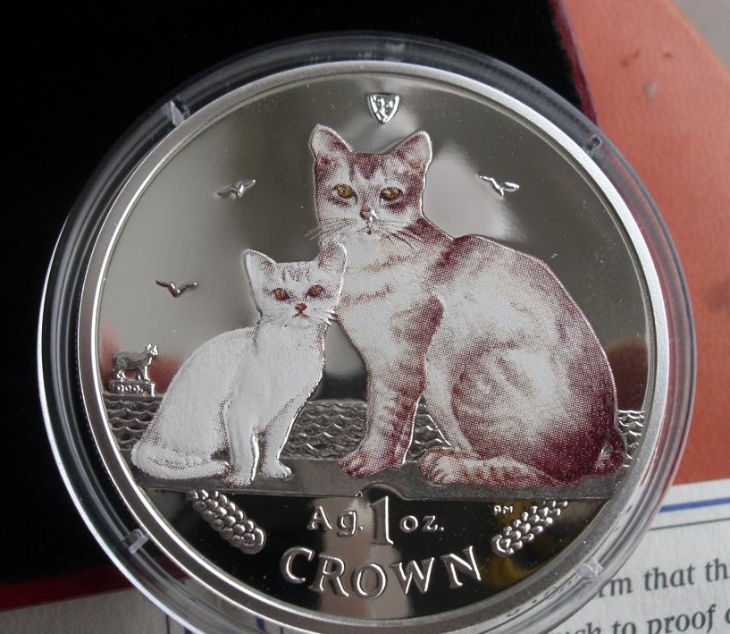 Монета с бурмиллой и котенком